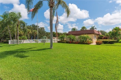 Ready to swap high-maintenance for high-enjoyment? This on The Dunedin Country Club in Florida - for sale on GolfHomes.com, golf home, golf lot