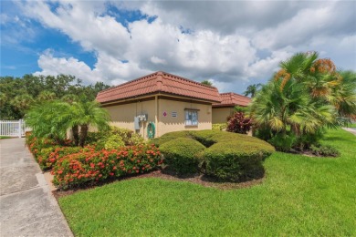 Ready to swap high-maintenance for high-enjoyment? This on The Dunedin Country Club in Florida - for sale on GolfHomes.com, golf home, golf lot