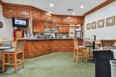 Absolutely Stunning Ground Floor Condo with Expansive views of on The Preserve Golf Club At Tara in Florida - for sale on GolfHomes.com, golf home, golf lot