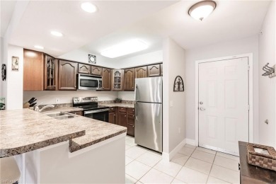 If you are looking for an affordably priced Naples condo with on Esplanade Golf and  Country Club in Florida - for sale on GolfHomes.com, golf home, golf lot