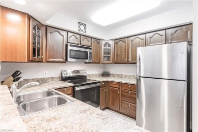 If you are looking for an affordably priced Naples condo with on Esplanade Golf and  Country Club in Florida - for sale on GolfHomes.com, golf home, golf lot