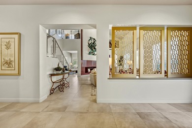 Experience modern luxury and sophisticated design in this fully on Rancho Mirage Country Club in California - for sale on GolfHomes.com, golf home, golf lot