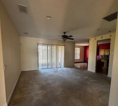 Delightful 2 bedroom, 2 bath home with a versatile den/office on Stonegate Golf Club in Florida - for sale on GolfHomes.com, golf home, golf lot