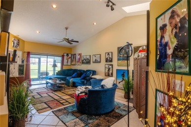This charming two-bedroom, two-bathroom townhouse offers a on Woodmont Country Club in Florida - for sale on GolfHomes.com, golf home, golf lot