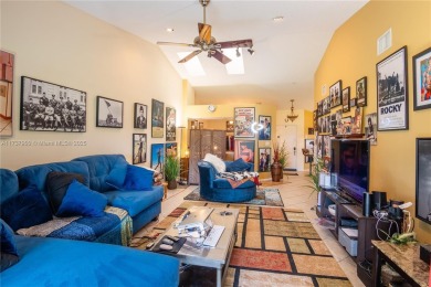 This charming two-bedroom, two-bathroom townhouse offers a on Woodmont Country Club in Florida - for sale on GolfHomes.com, golf home, golf lot