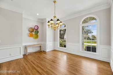 Views, views, views! The golf and nature vistas from this custom on Marsh Landing Country Club - Saint Johns County in Florida - for sale on GolfHomes.com, golf home, golf lot