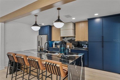 Set within the coveted Pasadena Golf Club Estates, 6619 Blue on Pasadena Yacht and Country Club in Florida - for sale on GolfHomes.com, golf home, golf lot