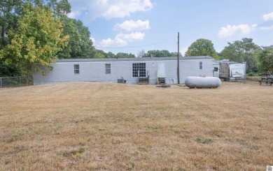 Cozy Weekend Getaway!  Escape to your own private retreat with on Mineral Mound Golf Course in Kentucky - for sale on GolfHomes.com, golf home, golf lot