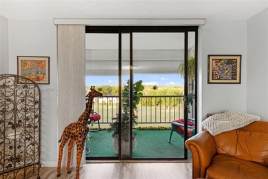 Beautiful 2-bedroom, 2-bath, 1,050 sq. ft. condo located in the on Deer Creek Golf Club in Florida - for sale on GolfHomes.com, golf home, golf lot