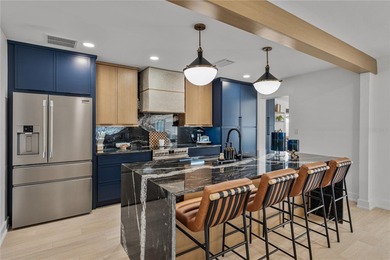 Set within the coveted Pasadena Golf Club Estates, 6619 Blue on Pasadena Yacht and Country Club in Florida - for sale on GolfHomes.com, golf home, golf lot