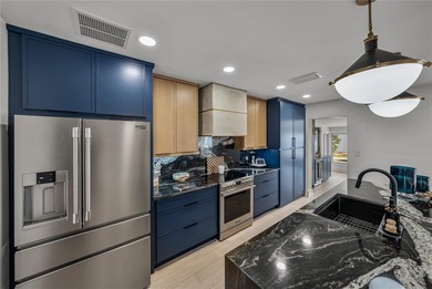 Set within the coveted Pasadena Golf Club Estates, 6619 Blue on Pasadena Yacht and Country Club in Florida - for sale on GolfHomes.com, golf home, golf lot