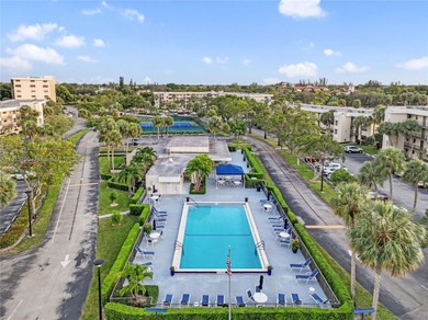 Beautiful 2-bedroom, 2-bath, 1,050 sq. ft. condo located in the on Deer Creek Golf Club in Florida - for sale on GolfHomes.com, golf home, golf lot