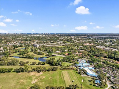 Beautiful 2-bedroom, 2-bath, 1,050 sq. ft. condo located in the on Deer Creek Golf Club in Florida - for sale on GolfHomes.com, golf home, golf lot