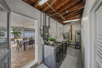 Under contract-accepting backup offers. Set within the coveted on Pasadena Yacht and Country Club in Florida - for sale on GolfHomes.com, golf home, golf lot