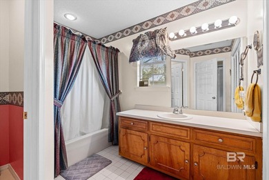 Perfectly positioned on an oversized golf course lot in the on Lake Forest Yacht and Country Club in Alabama - for sale on GolfHomes.com, golf home, golf lot