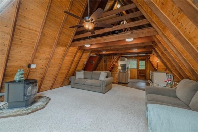 Welcome to your perfect weekend escape. This cozy chalet sits on on Innsbrook Resort Golf Course in Missouri - for sale on GolfHomes.com, golf home, golf lot