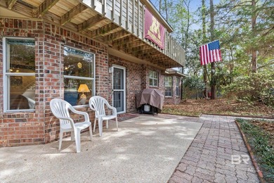 Perfectly positioned on an oversized golf course lot in the on Lake Forest Yacht and Country Club in Alabama - for sale on GolfHomes.com, golf home, golf lot