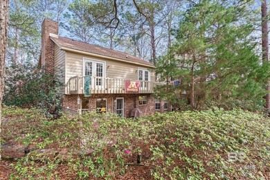 Perfectly positioned on an oversized golf course lot in the on Lake Forest Yacht and Country Club in Alabama - for sale on GolfHomes.com, golf home, golf lot