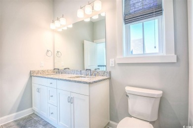 The Georgetown sits on Lot 49 in Living Dunes, a Grande Dunes on The Dunes Golf and Beach Club in South Carolina - for sale on GolfHomes.com, golf home, golf lot