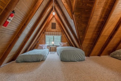 Welcome to your perfect weekend escape. This cozy chalet sits on on Innsbrook Resort Golf Course in Missouri - for sale on GolfHomes.com, golf home, golf lot
