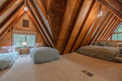 Welcome to your perfect weekend escape. This cozy chalet sits on on Innsbrook Resort Golf Course in Missouri - for sale on GolfHomes.com, golf home, golf lot