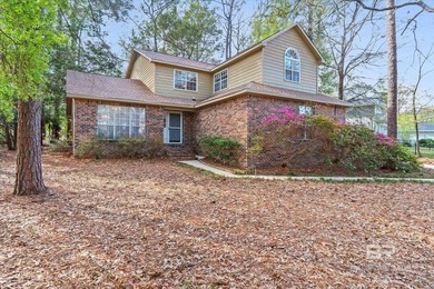Perfectly positioned on an oversized golf course lot in the on Lake Forest Yacht and Country Club in Alabama - for sale on GolfHomes.com, golf home, golf lot