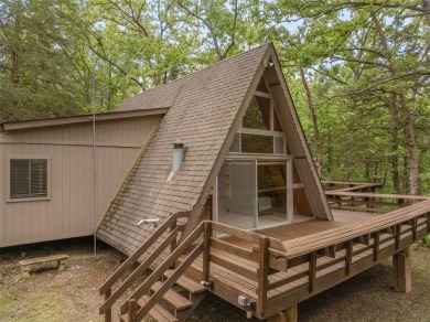 Welcome to your perfect weekend escape. This cozy chalet sits on on Innsbrook Resort Golf Course in Missouri - for sale on GolfHomes.com, golf home, golf lot