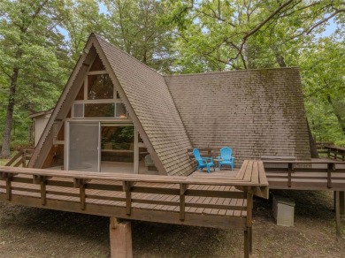 Welcome to your perfect weekend escape. This cozy chalet sits on on Innsbrook Resort Golf Course in Missouri - for sale on GolfHomes.com, golf home, golf lot