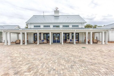 The Georgetown sits on Lot 49 in Living Dunes, a Grande Dunes on The Dunes Golf and Beach Club in South Carolina - for sale on GolfHomes.com, golf home, golf lot