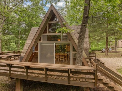 Welcome to your perfect weekend escape. This cozy chalet sits on on Innsbrook Resort Golf Course in Missouri - for sale on GolfHomes.com, golf home, golf lot