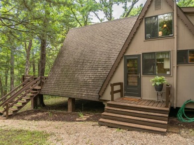 Welcome to your perfect weekend escape. This cozy chalet sits on on Innsbrook Resort Golf Course in Missouri - for sale on GolfHomes.com, golf home, golf lot