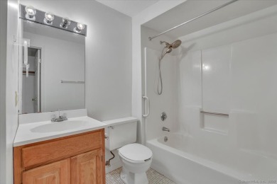 Welcome to easy living in the vibrant Pilgrims Harbor community on The Tradition Golf Club At Wallingford in Connecticut - for sale on GolfHomes.com, golf home, golf lot
