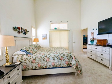 Beautiful lake and golf course views from this custom model home on The Great Outdoors Golf and Country Club in Florida - for sale on GolfHomes.com, golf home, golf lot