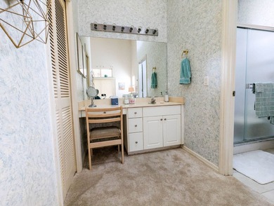 Beautiful lake and golf course views from this custom model home on The Great Outdoors Golf and Country Club in Florida - for sale on GolfHomes.com, golf home, golf lot