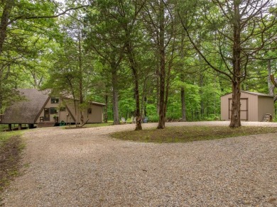 Welcome to your perfect weekend escape. This cozy chalet sits on on Innsbrook Resort Golf Course in Missouri - for sale on GolfHomes.com, golf home, golf lot