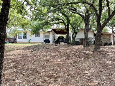 Vintage Lake Vision on Nocona Hills Golf Course in Texas - for sale on GolfHomes.com, golf home, golf lot