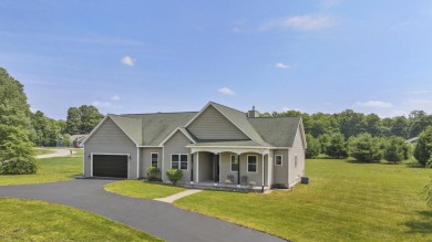 Escape to your perfect vacation retreat in Scenic North Village! on Crystal Mountain Golf Course in Michigan - for sale on GolfHomes.com, golf home, golf lot