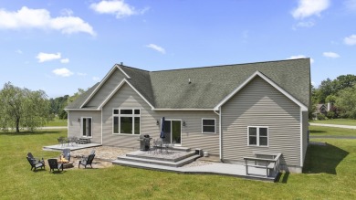 Escape to your perfect vacation retreat in Scenic North Village! on Crystal Mountain Golf Course in Michigan - for sale on GolfHomes.com, golf home, golf lot