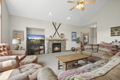 Escape to your perfect vacation retreat in Scenic North Village! on Crystal Mountain Golf Course in Michigan - for sale on GolfHomes.com, golf home, golf lot