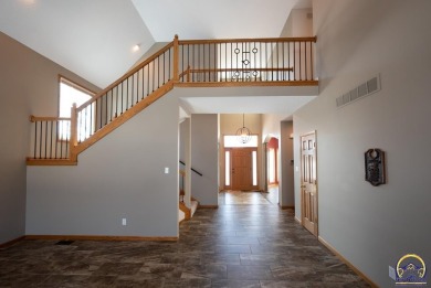 On Berkshire Golf Course, a striking design on a tucked-away lot on Berkshire Golf Club in Kansas - for sale on GolfHomes.com, golf home, golf lot