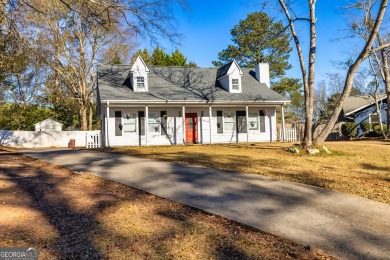 Welcome to this spacious and beautifully designed 5-bedroom on Canongate At Flat Creek Club in Georgia - for sale on GolfHomes.com, golf home, golf lot