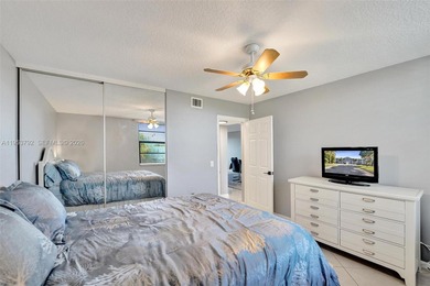 Move-in ready top-floor 2-bedroom, 2-bath condo with no on Pine Island Ridge Country Club in Florida - for sale on GolfHomes.com, golf home, golf lot