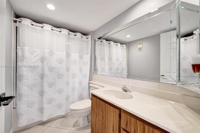 Move-in ready top-floor 2-bedroom, 2-bath condo with no on Pine Island Ridge Country Club in Florida - for sale on GolfHomes.com, golf home, golf lot