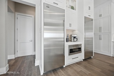 A custom home with panoramic Intracoastal views behind the gates on Queens Harbour Yacht and Country Club in Florida - for sale on GolfHomes.com, golf home, golf lot
