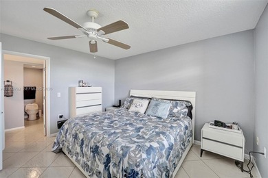 Move-in ready top-floor 2-bedroom, 2-bath condo with no on Pine Island Ridge Country Club in Florida - for sale on GolfHomes.com, golf home, golf lot