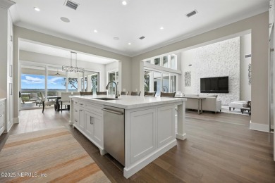 A custom home with panoramic Intracoastal views behind the gates on Queens Harbour Yacht and Country Club in Florida - for sale on GolfHomes.com, golf home, golf lot