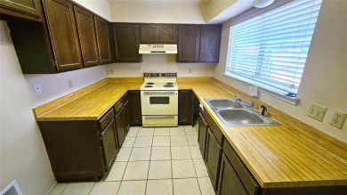 Welcome to 18 E Townhouse Lane in Grand Prairie--a charming on Prairie Lakes Golf Club in Texas - for sale on GolfHomes.com, golf home, golf lot