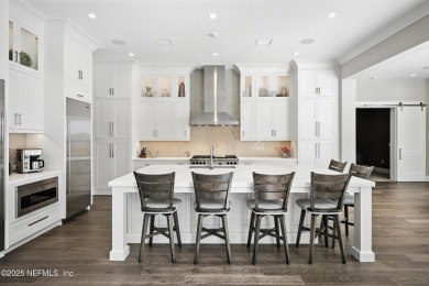 A custom home with panoramic Intracoastal views behind the gates on Queens Harbour Yacht and Country Club in Florida - for sale on GolfHomes.com, golf home, golf lot