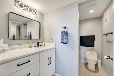 Move-in ready top-floor 2-bedroom, 2-bath condo with no on Pine Island Ridge Country Club in Florida - for sale on GolfHomes.com, golf home, golf lot