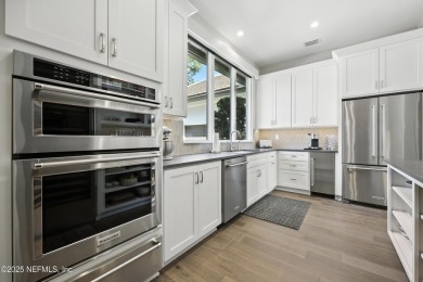 A custom home with panoramic Intracoastal views behind the gates on Queens Harbour Yacht and Country Club in Florida - for sale on GolfHomes.com, golf home, golf lot